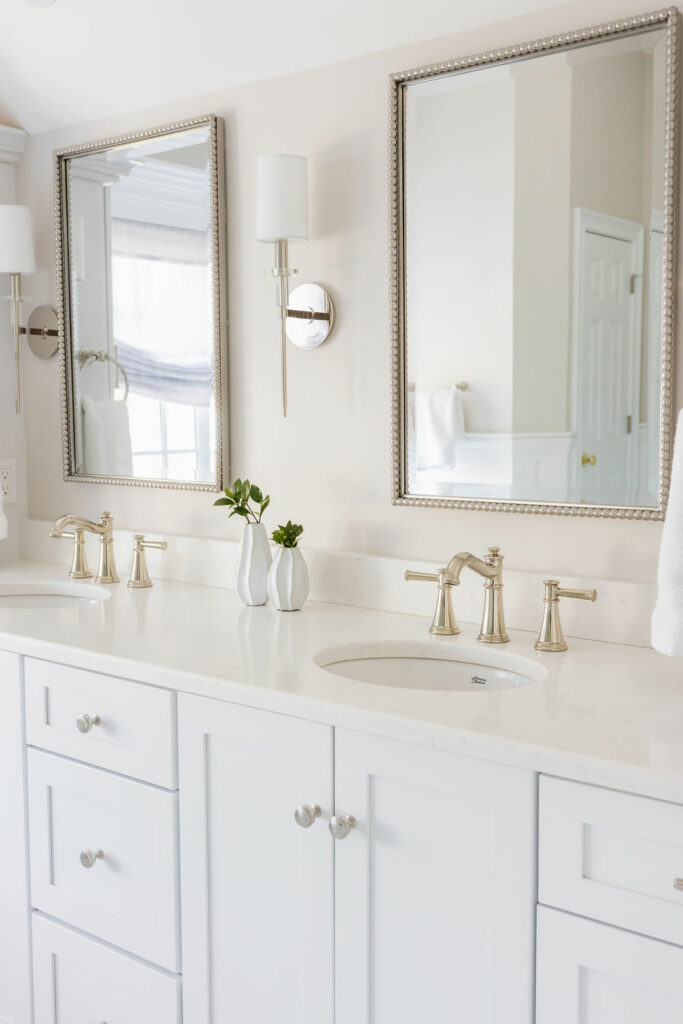 Mirrors with Sconces in between