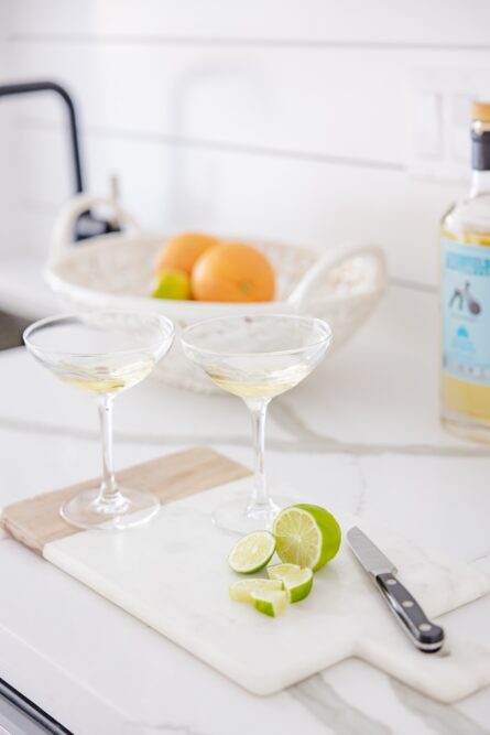 lime-on-cutting-board-with-martini-glasses