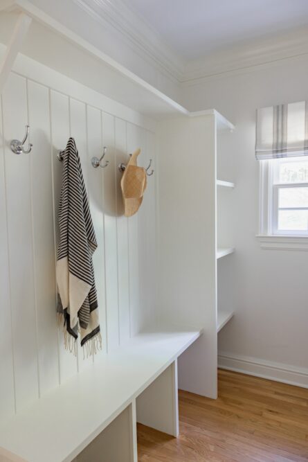 laundry-room-stoage-coat-hooks-white-built-in-bench